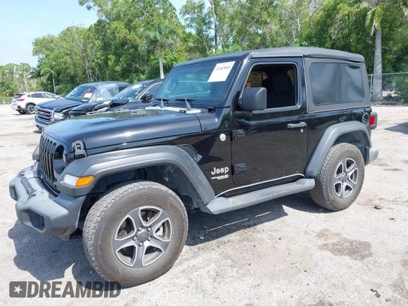 2019 Jeep Wrangler Sport S with VIN 1C4GJXAG2KW664395, listed as a IAAI auction lot 42683888 with 72,742 mi miles and . Bid and sale history available at DreamBid. Image 17.