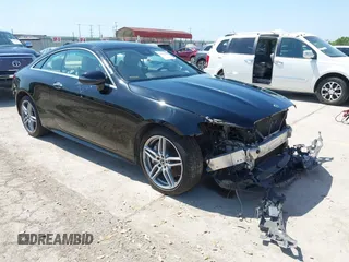2018 Mercedes-Benz E 400 z VIN WDD1J6GB6JF025761, wystawiony jako IAAI lot #41921119 z przebiegiem 70 458 mil mil oraz . Historia ofert i sprzedaży dostępna na DreamBid. Obrazek 1.