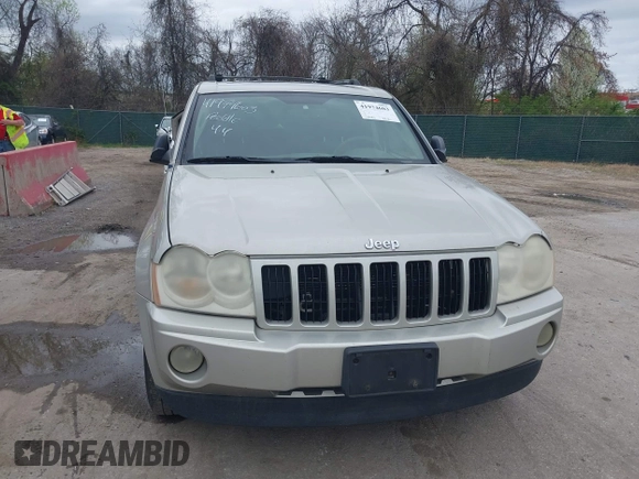 2007 Jeep Grand Cherokee Laredo z VIN 1J8HR48P77C548578, wystawiony jako IAAI lot #41974603 z przebiegiem 179 280 mil mil oraz . Historia ofert i sprzedaży dostępna na DreamBid. Obrazek 6.