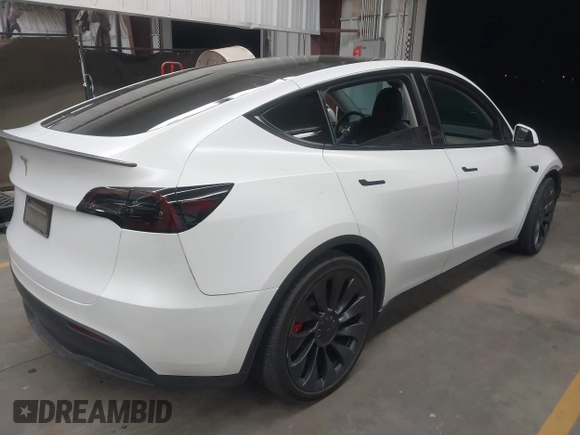 2023 Tesla Model Y Performance with VIN 7SAYGDEF5PF665560, listed as a IAAI auction lot 41809349 with Not Provided miles and . Bid and sale history available at DreamBid. Image 4.