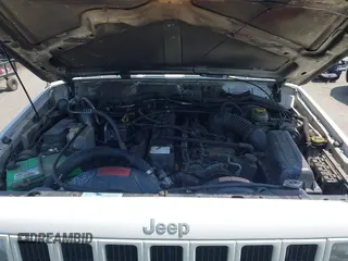 2000 Jeep Cherokee z VIN 1J4FT48S8YL214074, wystawiony jako IAAI lot #42577235 z przebiegiem 287 868 mil mil oraz . Historia ofert i sprzedaży dostępna na DreamBid. Obrazek 10.