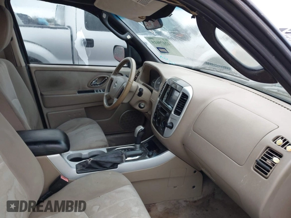 2007 Mercury Mariner Convenience with VIN 4M2YU80Z57KJ13939, listed as a IAAI auction lot 42479615 with 238,493 mi miles and . Bid and sale history available at DreamBid. Image 5.