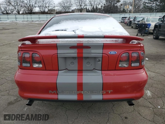 1996 Ford Mustang GT with VIN 1FALP42X9TF101569, listed as a Copart auction lot 45700545 with 119,083 mi miles and Salvage title. Bid and sale history available at DreamBid. Image 6.