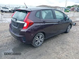2015 Honda Fit EX-L z VIN 3HGGK5H84FM734308, wystawiony jako IAAI lot #42572565 z przebiegiem 130 513 mil mil oraz . Historia ofert i sprzedaży dostępna na DreamBid. Obrazek 4.