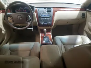 2006 Cadillac DTS 1SC z VIN 1G6KD57Y76U141402, wystawiony jako Copart lot #58715675 z przebiegiem 148 042 mil mil oraz Szkoda całkowita • Salvage title. Historia ofert i sprzedaży dostępna na DreamBid. Obrazek 8.