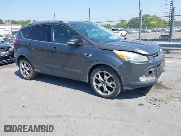 2015 Ford Escape Titanium with VIN 1FMCU0J94FUB24350, listed as a IAAI auction lot 42065641 with 168,215 mi miles. Bid and sale history available at carsss.com. Image 1.