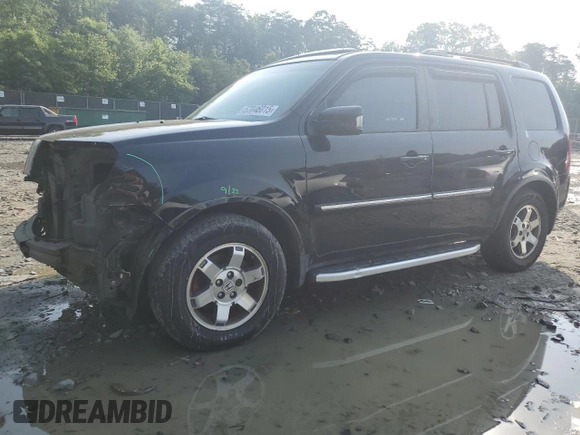 2011 Honda Pilot Touring z VIN 5FNYF4H92BB090512, wystawiony jako Copart lot #57046015 z przebiegiem 159 814 mil mil oraz Szkoda całkowita • Salvage title. Historia ofert i sprzedaży dostępna na DreamBid. Obrazek 1.