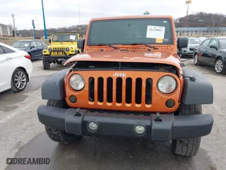 2011 Jeep Wrangler Sport with VIN 1J4AA2D16BL589390, listed as a IAAI auction lot 41478801 with 153,013 mi miles. Bid and sale history available at carsss.com. Image 12.