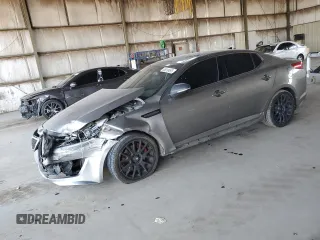 2013 Kia Optima SX z VIN 5XXGR4A69DG197690, wystawiony jako Copart lot #65010495 z przebiegiem Nie podano mil oraz Szkoda całkowita • Salvage title. Historia ofert i sprzedaży dostępna na DreamBid. Obrazek 1.