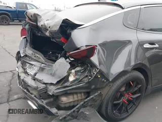 2016 Kia Optima SX Turbo with VIN 5XXGW4L2XGG012408, listed as a IAAI auction lot 42465787 with 67,564 mi miles and . Bid and sale history available at DreamBid. Image 12.