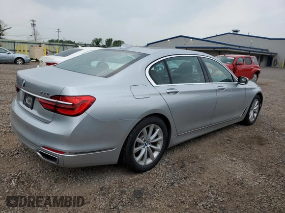 2018 BMW 7 Series 740i xDrive with VIN WBA7E4C56JGV23835, listed as a Copart auction lot 55254573 with 103,713 mi miles. Bid and sale history available at carsss.com. Image 3.
