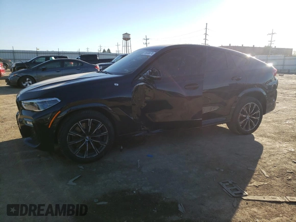 2020 BMW X6 xDrive40i z VIN 5UXCY6C03L9D00816, wystawiony jako Copart lot #76538674 z przebiegiem Nie podano mil oraz Szkoda całkowita • Salvage title. Historia ofert i sprzedaży dostępna na DreamBid. Obrazek 1.