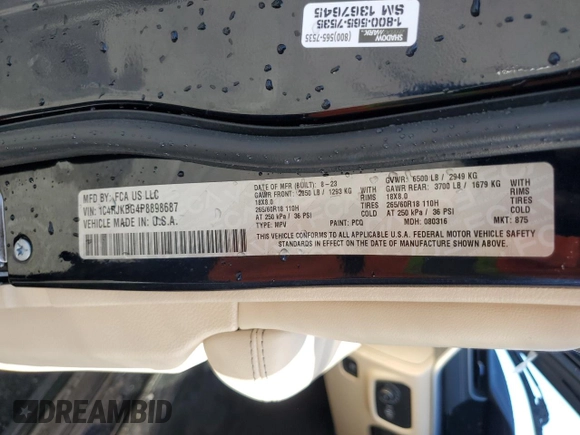 2023 Jeep Grand Cherokee Limited z VIN 1C4RJKBG4P8898687, wystawiony jako Copart lot #57346475 z przebiegiem 28 431 mil mil oraz Szkoda całkowita • Salvage title. Historia ofert i sprzedaży dostępna na DreamBid. Obrazek 14.