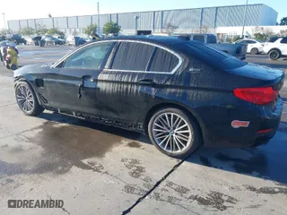 2019 BMW 5 Series 530e iPerformance with VIN WBAJA9C56KB398686, listed as a IAAI auction lot 41507090 with 64,395 mi miles. Bid and sale history available at carsss.com. Image 3.
