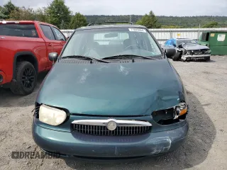 1999 Mercury Villager z VIN 4M2XV11T1XDJ23740, wystawiony jako Copart lot #71845964 z przebiegiem 137 758 mil mil oraz Szkody całkowita. Historia ofert i sprzedaży dostępna na DreamBid. Obrazek 5.