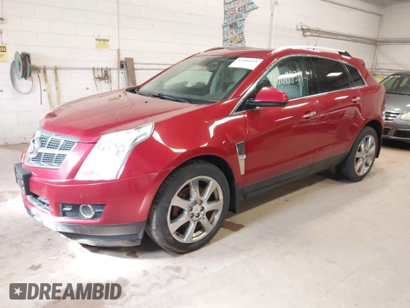 2012 Cadillac SRX Performance Collection with VIN 3GYFNEE36CS657582, listed as a IAAI auction lot 42084319 with 171,335 mi miles. Bid and sale history available at carsss.com. Image 2.