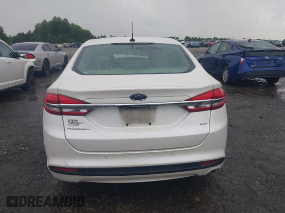 2018 Ford Fusion SE z VIN 3FA6P0H75JR159448, wystawiony jako IAAI lot #42262839 z przebiegiem 144 353 mil mil oraz . Historia ofert i sprzedaży dostępna na DreamBid. Obrazek 16.