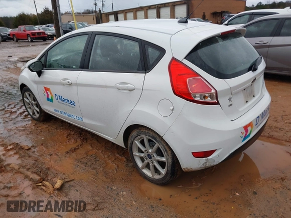 2016 Ford Fiesta SE with VIN 3FADP4EJ2GM157810, listed as a IAAI auction lot 41011326 with 214,609 mi miles. Bid and sale history available at carsss.com. Image 3.