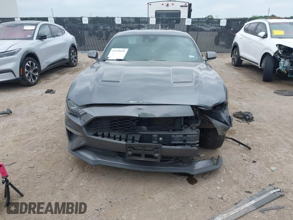 2021 Ford Mustang EcoBoost with VIN 1FA6P8TH1M5152941, listed as a IAAI auction lot 42110646 with 26,673 mi miles and . Bid and sale history available at DreamBid. Image 6.