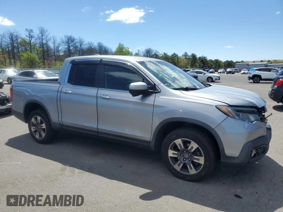 2017 Honda Ridgeline RTL-T with VIN 5FPYK3F65HB012868, listed as a Copart auction lot 57562885 with 115,530 mi miles and Salvage title. Bid and sale history available at DreamBid. Image 4.