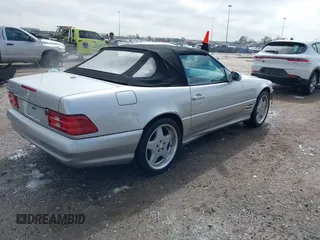 2000 Mercedes-Benz SL with VIN WDBFA68F0YF188738, listed as a IAAI auction lot 41652926 with 61,075 mi miles. Bid and sale history available at carsss.com. Image 4.