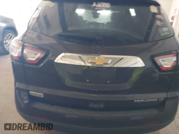 2015 Chevrolet Traverse LT with VIN 1GNKRGKDXFJ371359, listed as a IAAI auction lot 42691574 with Not provided miles and . Bid and sale history available at DreamBid. Image 16.