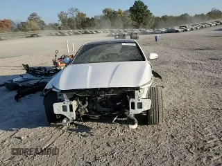 2023 Genesis G70 2.0T with VIN KMTG34TA3PU105184, listed as a Copart auction lot 77366344 with 36,582 mi miles and Salvage Title. Bid and sale history available at carsss.com. Image 11.