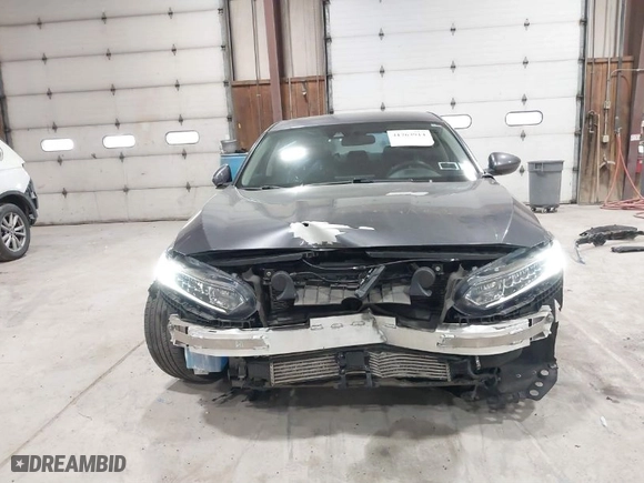 2018 Honda Accord Sedan LX 1.5T with VIN 1HGCV1F11JA155755, listed as a IAAI auction lot 41763914 with 62,897 mi miles. Bid and sale history available at carsss.com. Image 6.