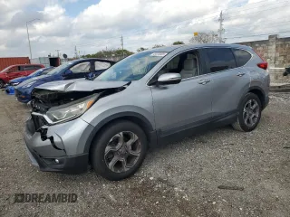 2017 Honda CR-V EX with VIN 7FARW1H58HE011809, listed as a Copart auction lot 48028085 with 63,510 mi miles and Salvage Title. Bid and sale history available at carsss.com. Image 1.
