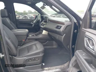 2022 Chevrolet Suburban Z71 with VIN 1GNSKDKD7NR151681, listed as a IAAI auction lot 41991670 with 57,090 mi miles and . Bid and sale history available at DreamBid. Image 5.