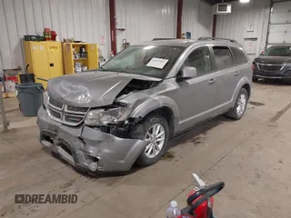 2016 Dodge Journey SXT with VIN 3C4PDCBG0GT198686, listed as a IAAI auction lot 41561007 with 85,289 mi miles. Bid and sale history available at carsss.com. Image 2.