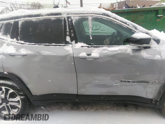2022 Jeep Compass High Altitude with VIN 3C4NJDCB7NT104499, listed as a IAAI auction lot 41303791 with 76,711 mi miles and . Bid and sale history available at carsss.com. Image 17.