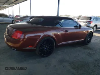 2007 Bentley Continental GT with VIN SCBDR33W77C047935, listed as a Copart auction lot 60557985 with 61,661 mi miles and Salvage title. Bid and sale history available at DreamBid. Image 3.