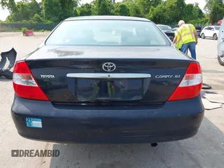 2003 Toyota Camry LE z VIN 4T1BE30KX3U197331, wystawiony jako IAAI lot #42298164 z przebiegiem 248 008 mil mil oraz . Historia ofert i sprzedaży dostępna na DreamBid. Obrazek 16.
