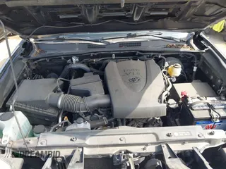 2017 Toyota Tacoma SR5 z VIN 3TMAZ5CN2HM047103, wystawiony jako IAAI lot #42344844 z przebiegiem 88 090 mil mil oraz . Historia ofert i sprzedaży dostępna na DreamBid. Obrazek 10.