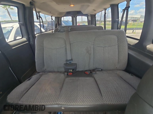 2005 Chevrolet Express Passenger with VIN 1GAHG39U151149680, listed as a IAAI auction lot 42633644 with 165,707 mi miles and . Bid and sale history available at DreamBid. Image 32.