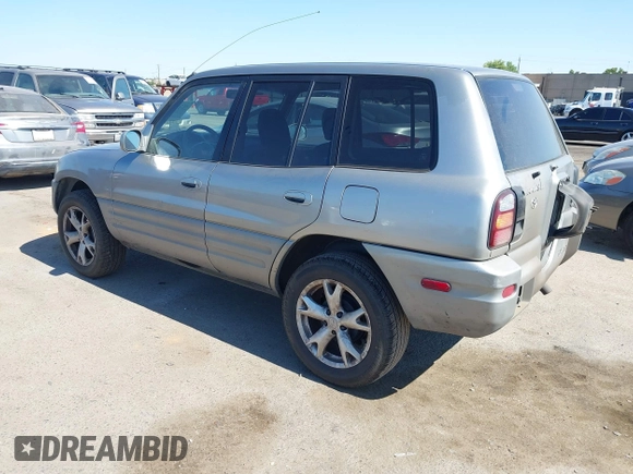 1999 Toyota RAV4 with VIN JT3GP10V4X7055360, listed as a IAAI auction lot 42718612 with 238,904 mi miles and . Bid and sale history available at DreamBid. Image 3.