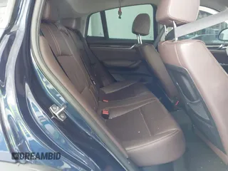 2015 BMW X4 xDrive28i with VIN 5UXXW3C51F0M87268, listed as a IAAI auction lot 42366363 with 143,285 mi miles and . Bid and sale history available at DreamBid. Image 8.