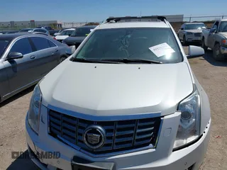 2014 Cadillac SRX Performance Collection with VIN 3GYFNFE35ES582897, listed as a IAAI auction lot 41978361 with 144,116 mi miles and . Bid and sale history available at DreamBid. Image 12.