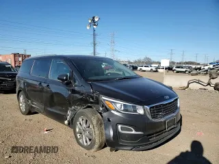 2021 Kia Sedona LX with VIN KNDMB5C1XM6671806, listed as a Copart auction lot 83027514 with 58,884 mi miles and Salvage Title. Bid and sale history available at carsss.com. Image 12.