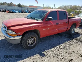 2000 Dodge Dakota Sport with VIN 1B7GL2AX0YS727510, listed as a Copart auction lot 50072675 with 303,427 mi miles and Salvage Title. Bid and sale history available at carsss.com. Image 1.