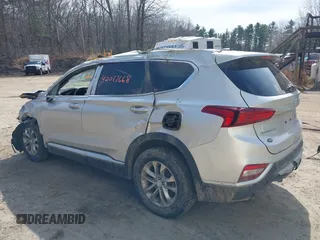 2019 Hyundai Santa Fe SE z VIN 5NMS2CAD5KH115511, wystawiony jako IAAI lot #42017668 z przebiegiem 91 584 mil mil oraz . Historia ofert i sprzedaży dostępna na DreamBid. Obrazek 3.