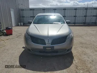 2016 Lincoln MKS z VIN 1LNHL9DK7GG600389, wystawiony jako Copart lot #49581535 z przebiegiem 120 440 mil mil oraz Czysty tytuł • Clean title. Historia ofert i sprzedaży dostępna na DreamBid. Obrazek 5.