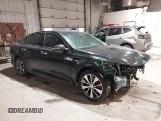 2016 Kia Optima SX Turbo with VIN 5XXGW4L27GG106780, listed as a IAAI auction lot 41586007 with 114,756 mi miles and . Bid and sale history available at carsss.com. Image 1.