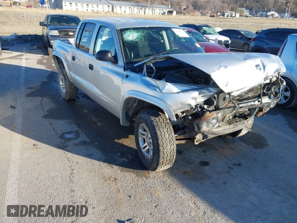 2004 Dodge Dakota Sport with VIN 1D7HG38K34S561735, listed as a IAAI auction lot 41409622 with Not Provided miles. Bid and sale history available at carsss.com. Image 1.