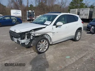 2014 Mazda CX-5 Grand Touring with VIN JM3KE4DY0E0343777, listed as a IAAI auction lot 41464395 with 126,214 mi miles. Bid and sale history available at carsss.com. Image 17.