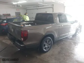 2020 Honda Ridgeline RTL-E with VIN 5FPYK3F75LB001516, listed as a IAAI auction lot 41605859 with 93,902 mi miles. Bid and sale history available at carsss.com. Image 4.