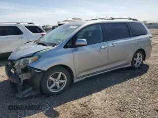 2014 Toyota Sienna SE with VIN 5TDXK3DC5ES454456, listed as a Copart auction lot 47098515 with 190,541 mi miles and Salvage Title. Bid and sale history available at DreamBid. Image 1.