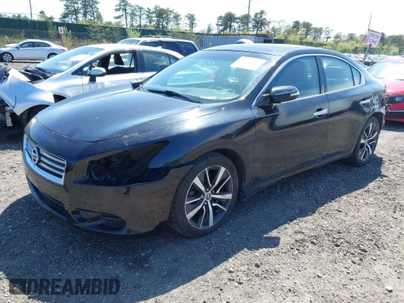 2014 Nissan Maxima S with VIN 1N4AA5AP0EC445232, listed as a IAAI auction lot 42154984 with 91,205 mi miles and . Bid and sale history available at DreamBid. Image 2.