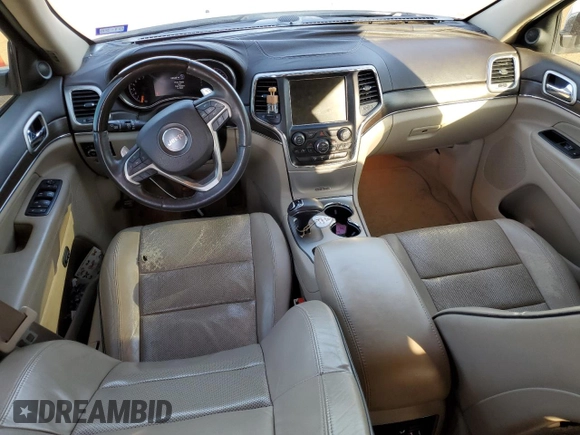 2014 Jeep Grand Cherokee Overland with VIN 1C4RJECGXEC529438, listed as a Copart auction lot 45693285 with 154,674 mi miles and Salvage Title. Bid and sale history available at carsss.com. Image 8.